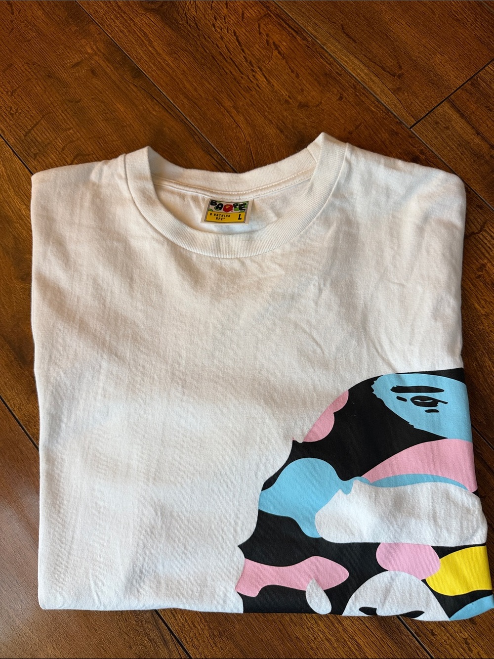 Bape White Tee with Pink, Blue, Black & Yellow Camo Graphic